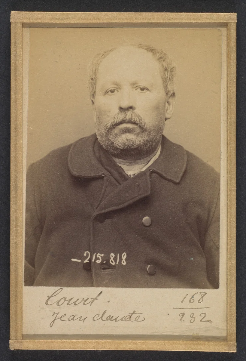 Court. Jean-Claude. 58 ans, né à Cherissey-le-M. (Haute-Savoie). Marchand de pains d'épices. Anarchiste. 17/3/94 by Alphonse Bertillon, photograph, 1894