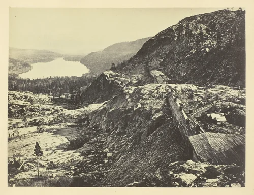 Summit of Sierra Nevada, Snow Sheds in Foreground, Donner Lake in the Distance, C. P. R. R. by Andrew J. Russell, photograph, 1868-1869