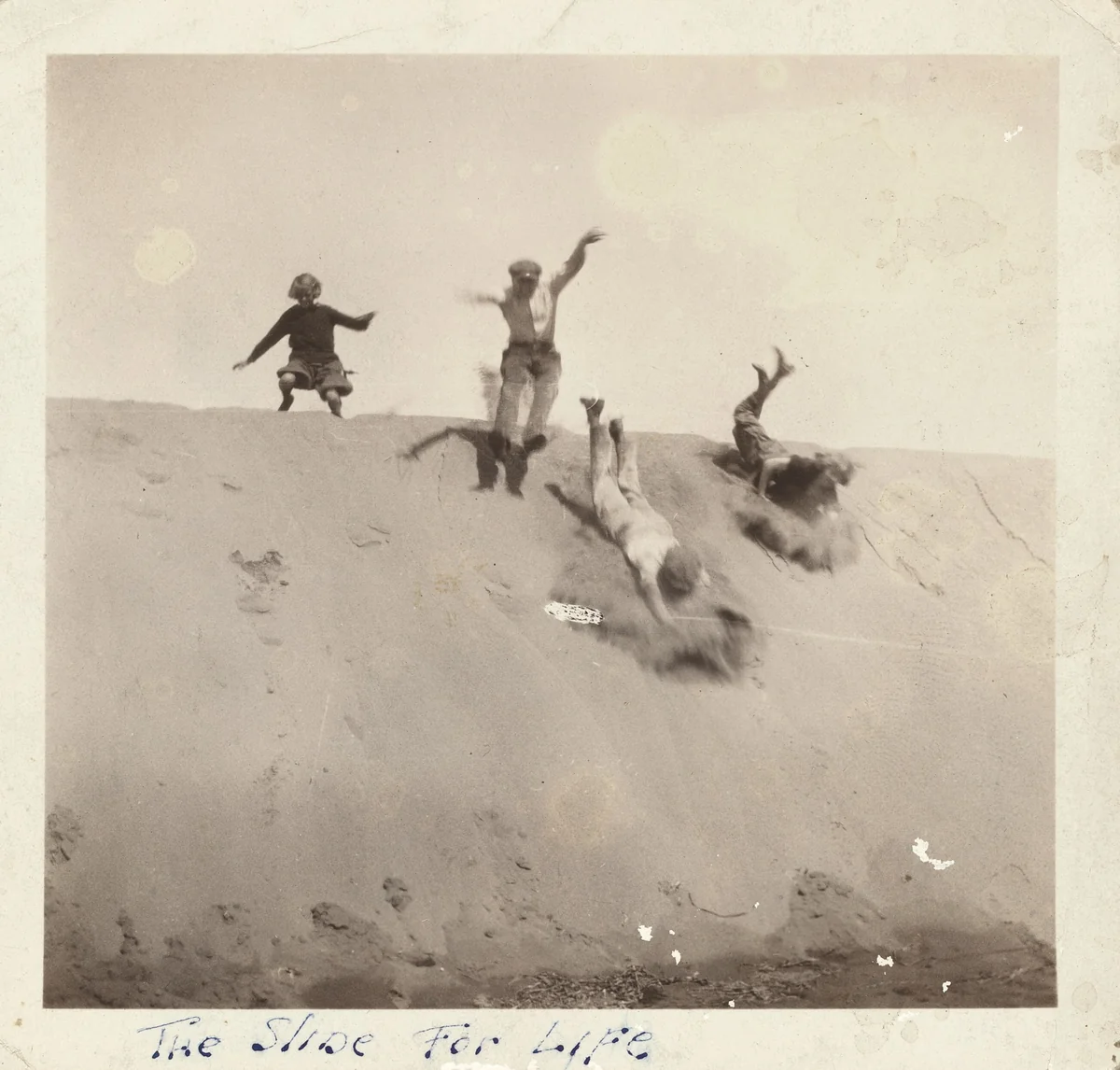 "The Slide For Life" by American 20th Century, photograph, 1890-1919