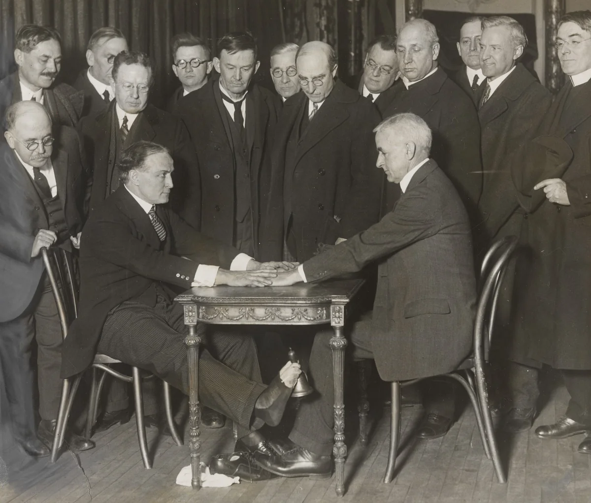 "Houdini Exposes Spirit Trickery to New York Clergymen" by Times Wide World Photos, photograph, 1925