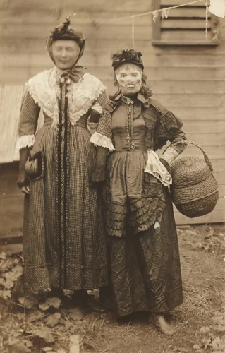 Untitled (Two people in costumes) by American 20th Century, photograph, 1890-1919